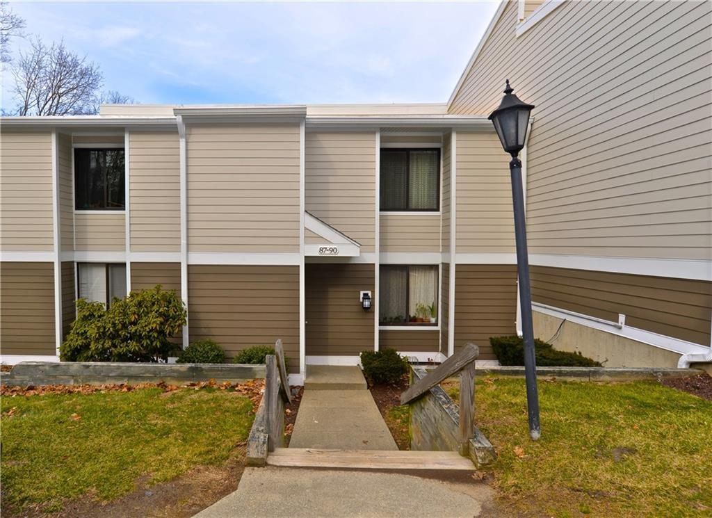 90 Olcott Way, Unit 90 Ridgefield, CT 06877 - Photo 1 of 1 a view of house with patio