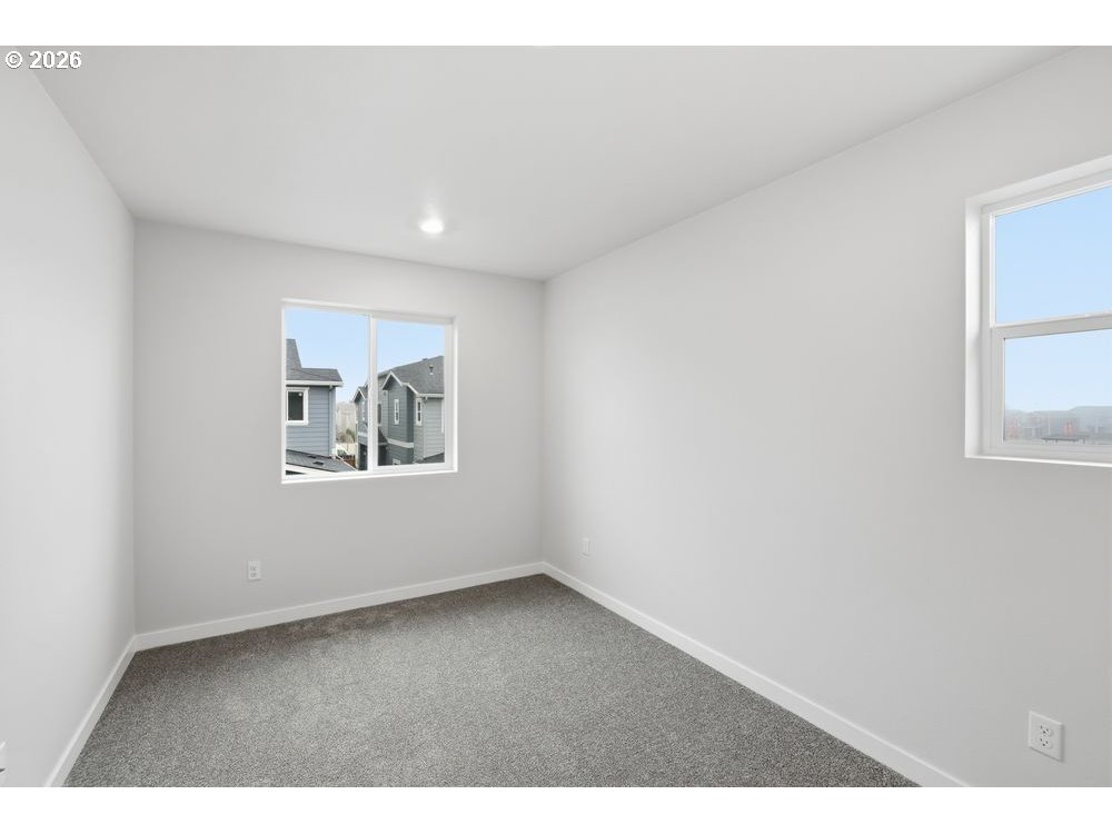 3724 Southwest 40th Street Gresham, OR 97080 - Photo 11 of 13 a view of an empty room with a window