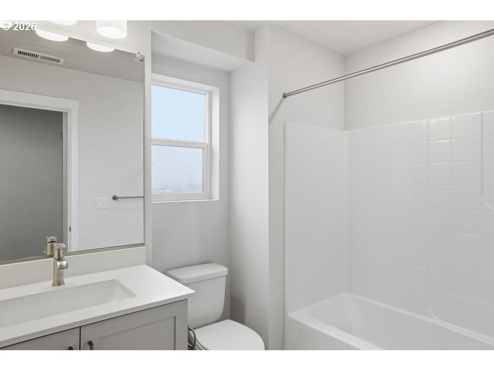 3724 Southwest 40th Street Gresham, OR 97080 - Photo 12 of 13 a bathroom with a sink and a mirror