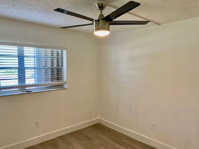 600 Southwest 2nd Avenue, Unit 140 Boca Raton, FL 33432 - Photo 6 of 30 an empty room with a window