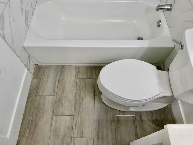 600 Southwest 2nd Avenue, Unit 140 Boca Raton, FL 33432 - Photo 10 of 30 a bathroom with a toilet and a shower