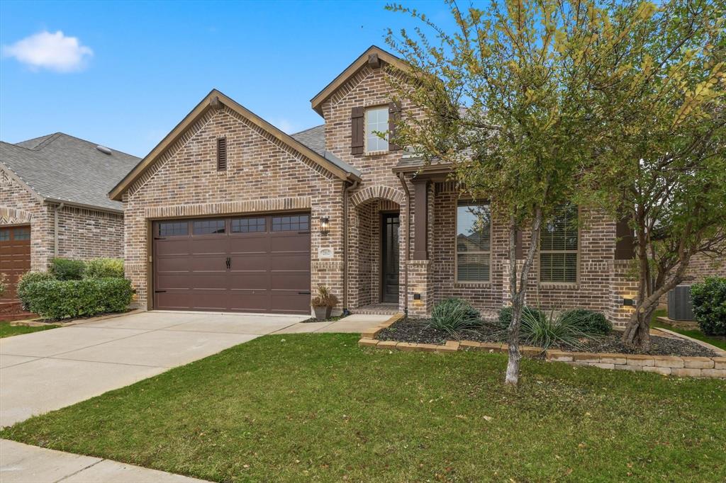 2912 Winding Ridge Court Little Elm, TX 75068 - Photo 39 of 40 Gorgeous front of home with a great patio to relax with or watch the kids ride bikes in the cul-de-sac.