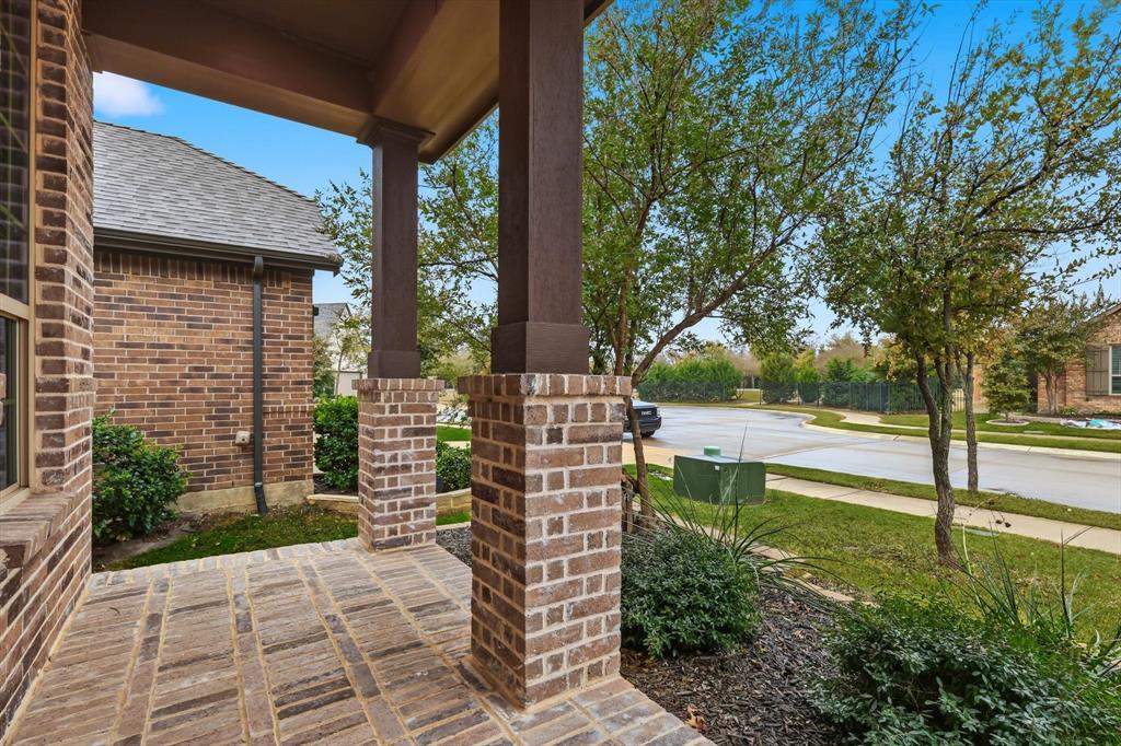 2912 Winding Ridge Court Little Elm, TX 75068 - Photo 7 of 40 View of front patio, where you can relax and enjoy the neighborhood!