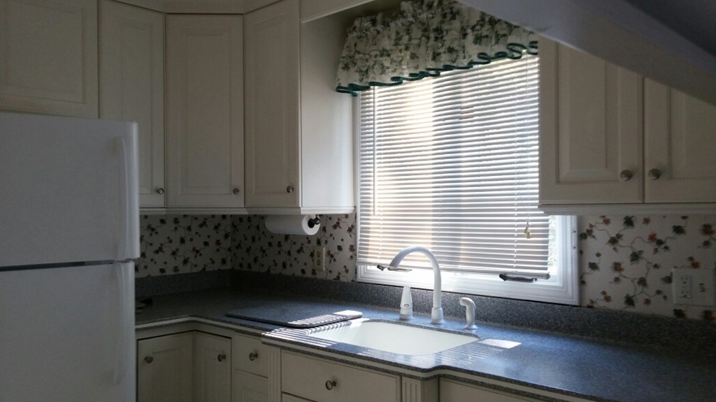 7 Hay Road Ashburnham, MA 01430 - Photo 8 of 15 a bathroom with a granite countertop sink and a window