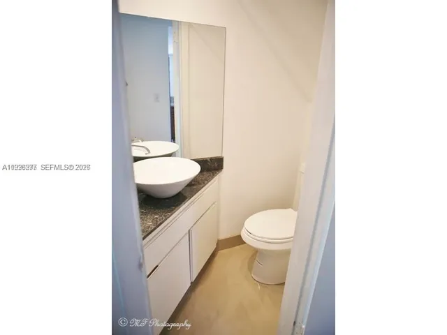 a view of a room with windows