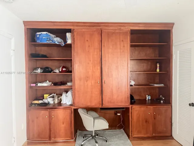 a view of a room with a large window