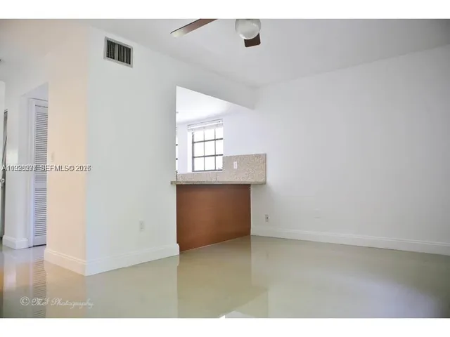 a living room with a couch and a table