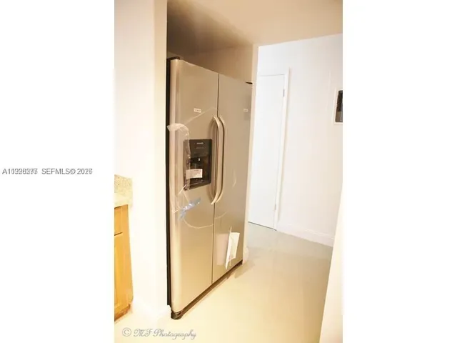 a kitchen with a stove and a microwave