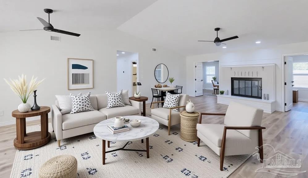 2115 Stallion Road Cantonment, FL 32533 - Photo 17 of 70 a living room with furniture and a fireplace