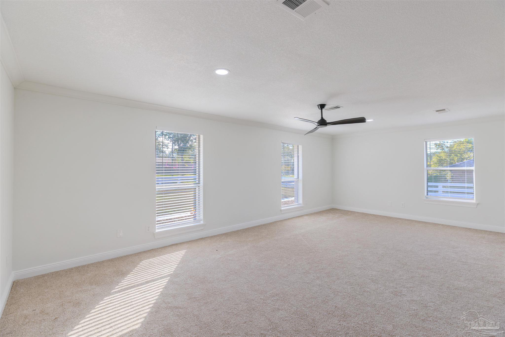 2115 Stallion Road Cantonment, FL 32533 - Photo 30 of 70 a view of an empty room with a window