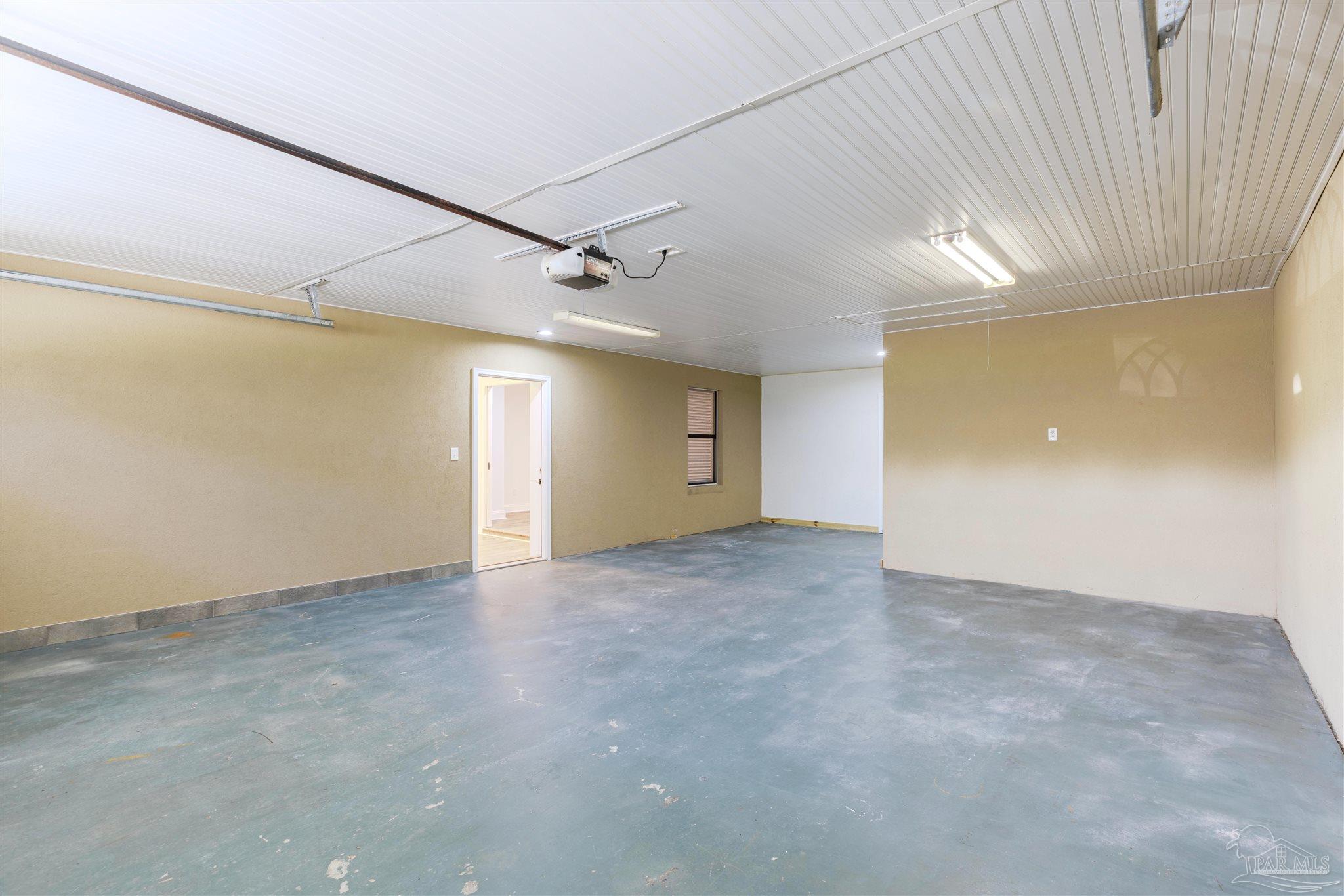 2115 Stallion Road Cantonment, FL 32533 - Photo 63 of 70 a view of an empty room with a window