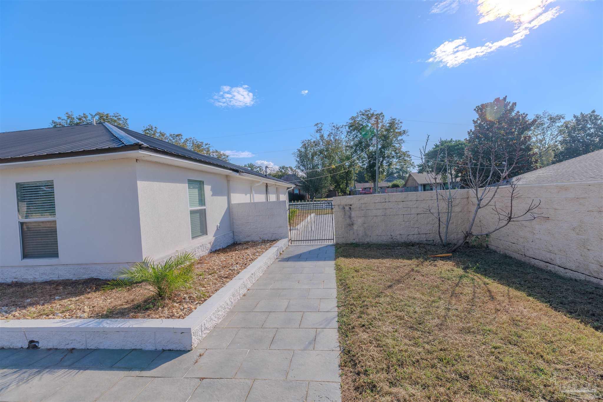 2115 Stallion Road Cantonment, FL 32533 - Photo 69 of 70 a view of a back yard of the house
