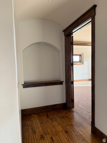 4536 North 475 East Provo, UT 84604 - Photo 45 of 65 Archway niche with integrated lighting, wood-finish flooring, dark wood trim, and a recessed ceiling light