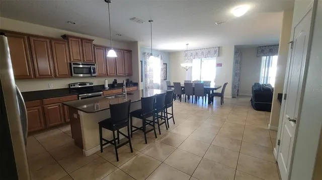 a group of people sitting in a living room