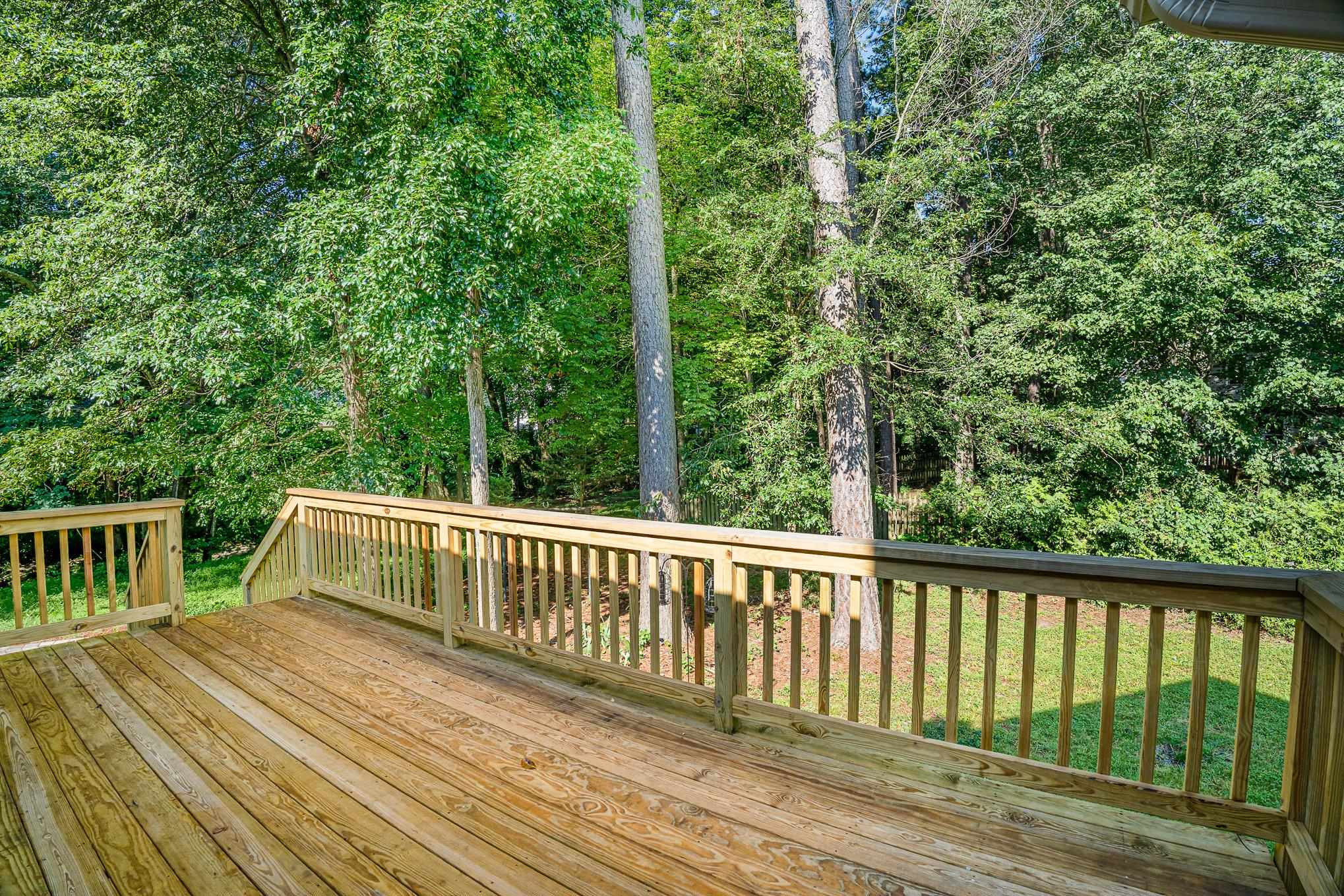 4924 Knightsbridge Way Raleigh, NC 27604 - Photo 3 of 27 a view of backyard with deck and deck