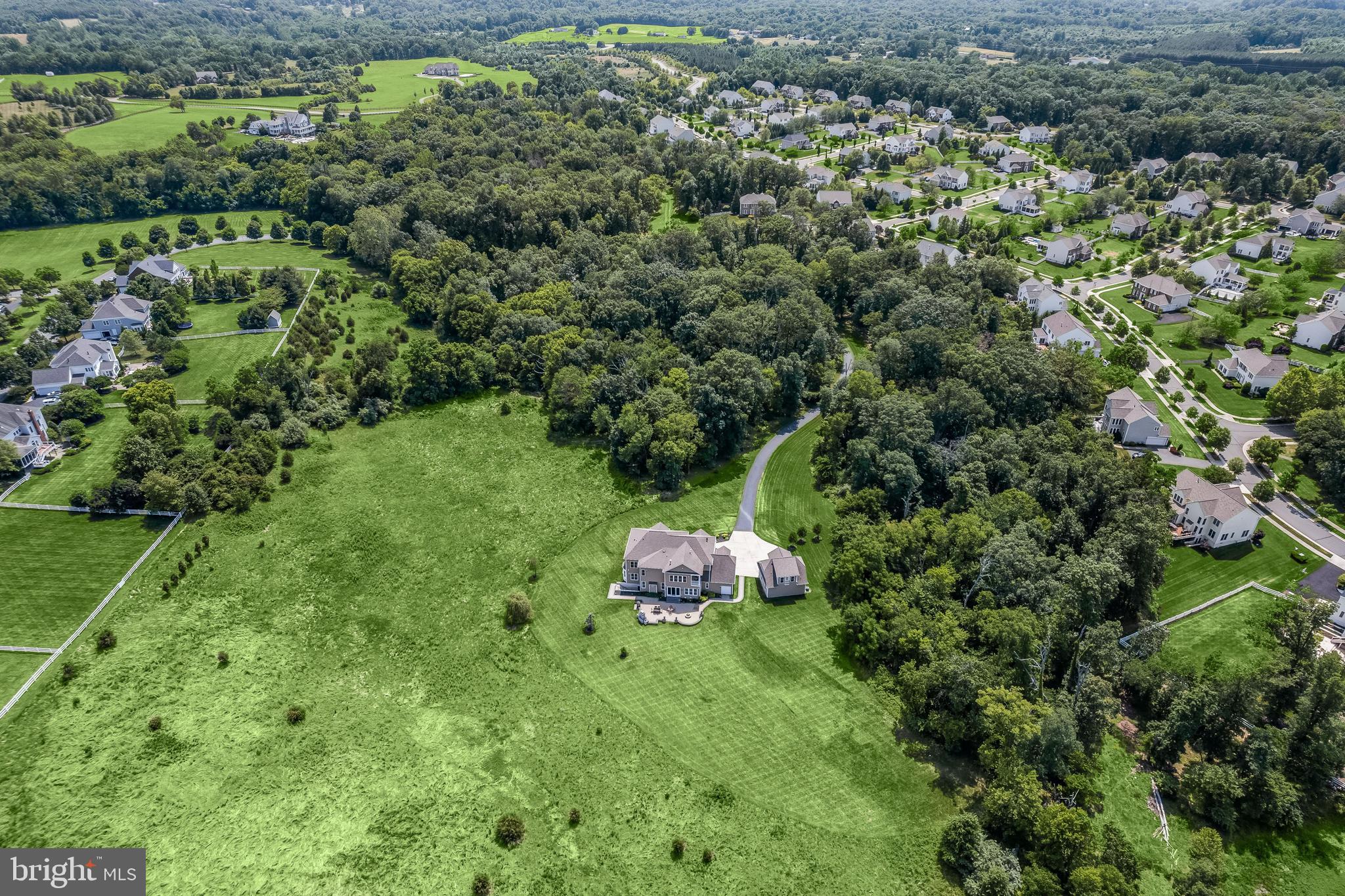 21151 Mill Branch Drive Leesburg, VA 20175 - Photo 127 of 132 a backyard of a house with a yard and outdoor seating