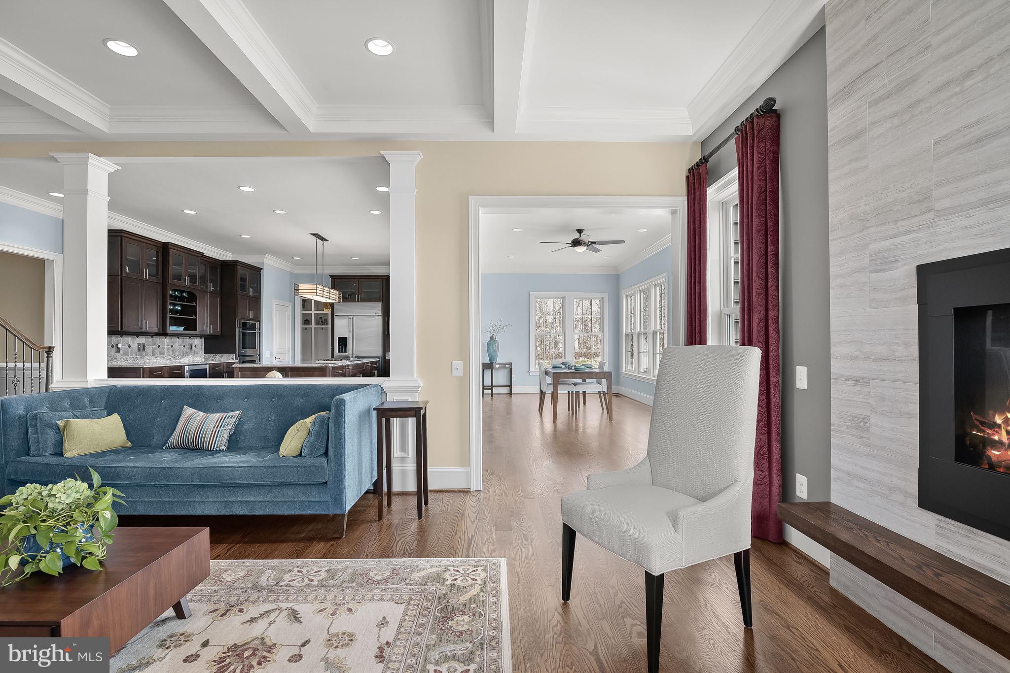 21151 Mill Branch Drive Leesburg, VA 20175 - Photo 29 of 132 a living room with furniture and a wooden floor