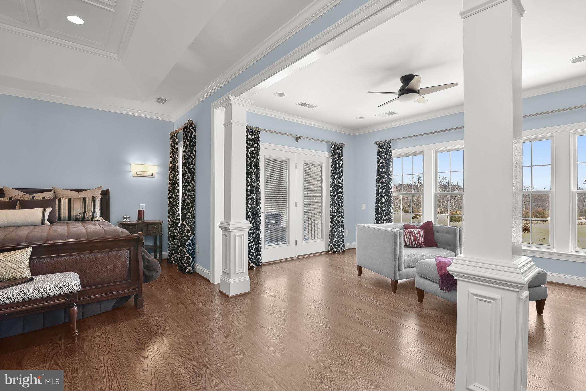 21151 Mill Branch Drive Leesburg, VA 20175 - Photo 50 of 132 a living room with furniture and a large window