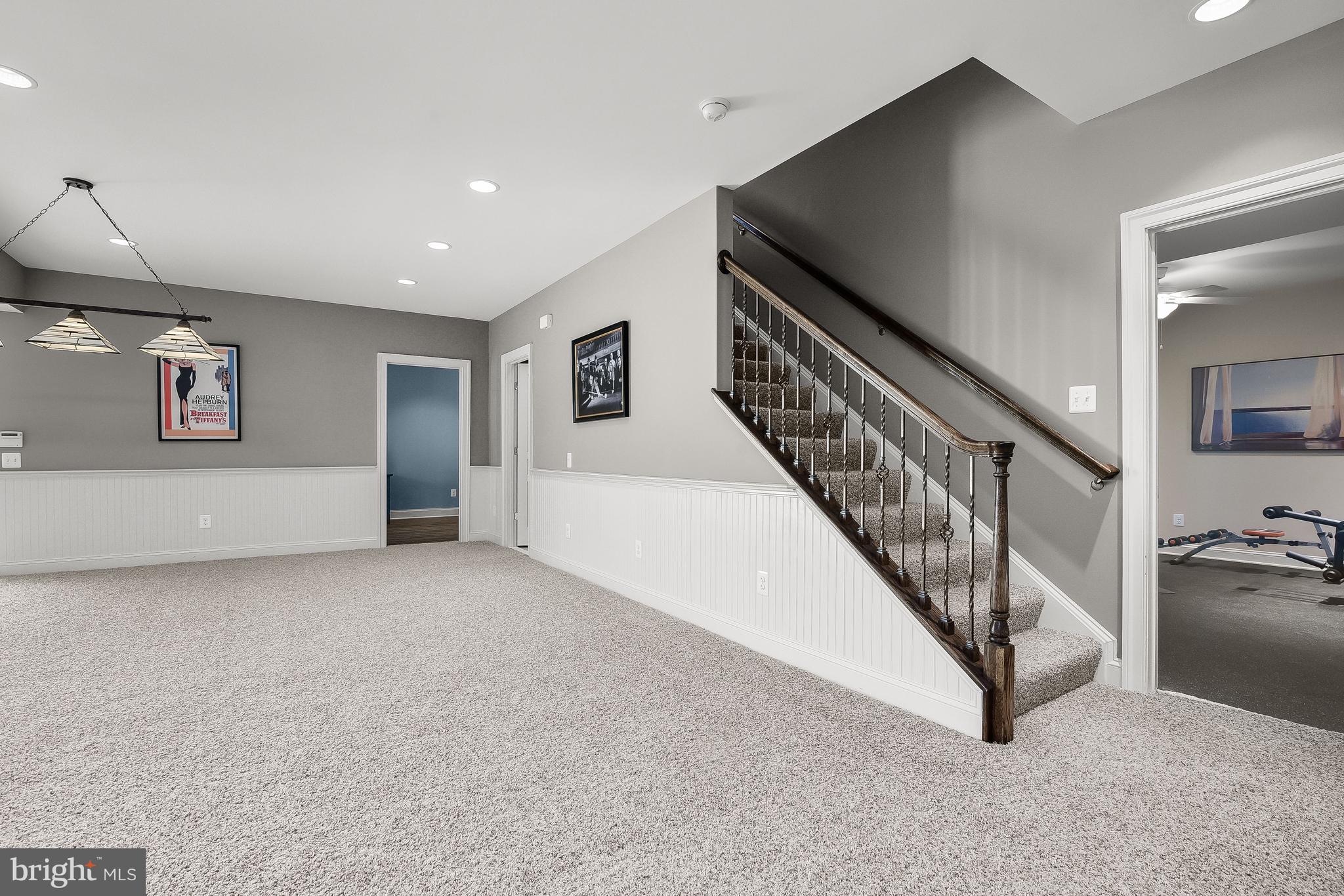 21151 Mill Branch Drive Leesburg, VA 20175 - Photo 75 of 132 Open Stair to Lower Level & Billiards Area