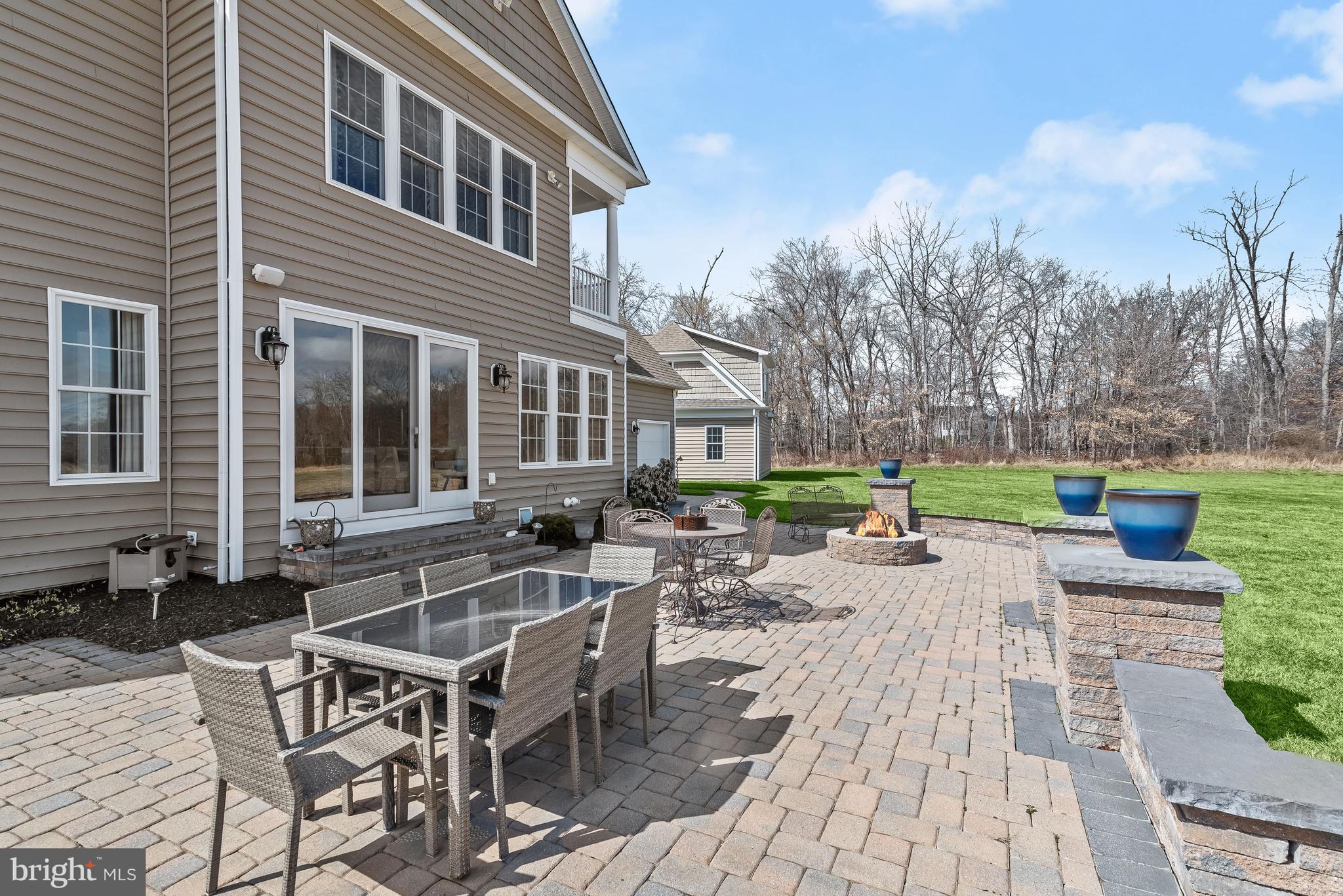 21151 Mill Branch Drive Leesburg, VA 20175 - Photo 92 of 132 a view of a house with backyard swimming pool and sitting area