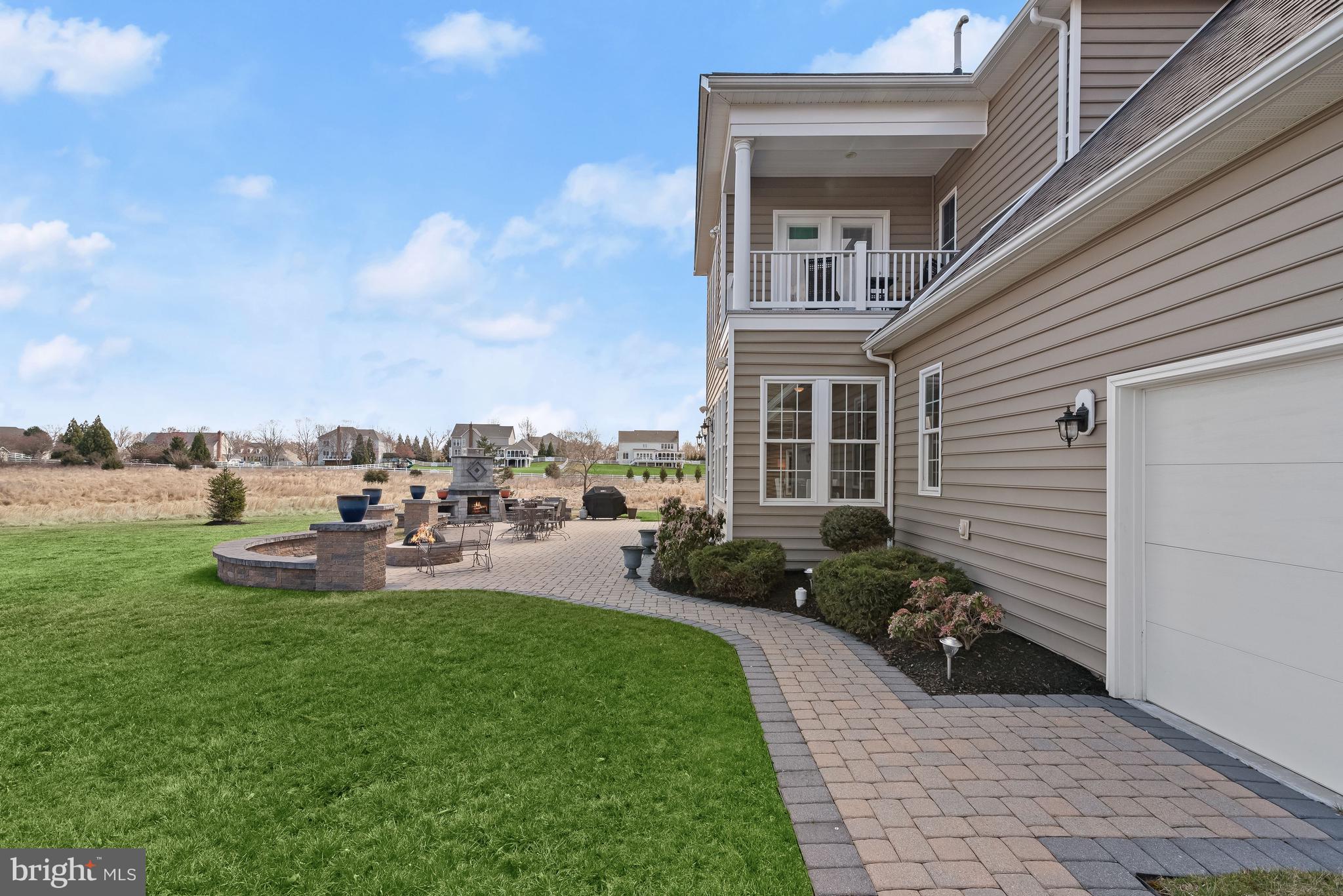 21151 Mill Branch Drive Leesburg, VA 20175 - Photo 97 of 132 a view of a house with backyard porch and sitting area