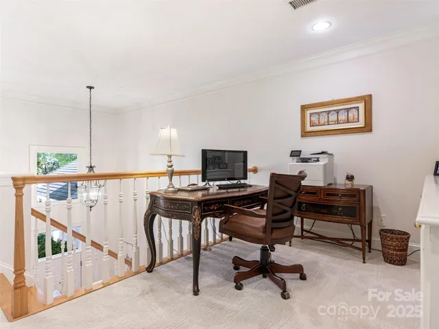 a view of a workspace with furniture