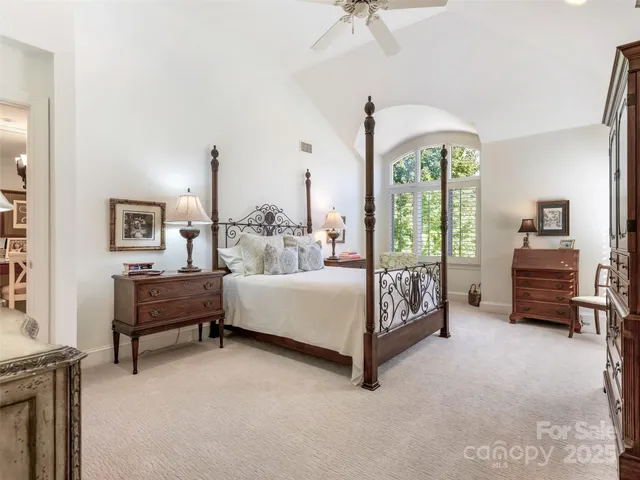 a bed room with furniture and a window