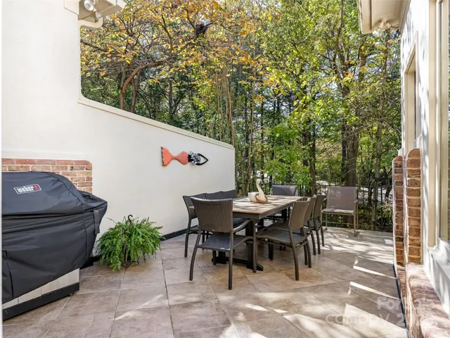 a view of a tables and chairs in patio