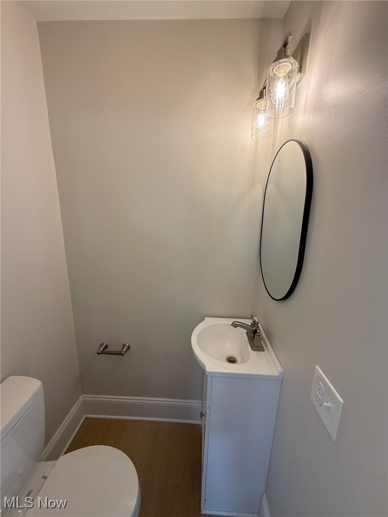 2185 Rexwood Road Cleveland, OH 44118 - Photo 18 of 26 Bathroom with dark wood-type flooring and vanity