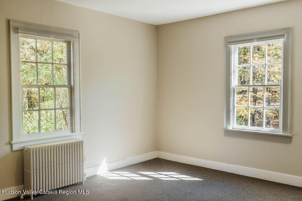 3927 Main Street Stone Ridge, NY 12484 - Photo 16 of 32 an empty room with a window