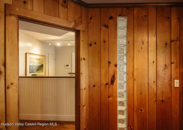 a view of a bathroom with a shower and a sink