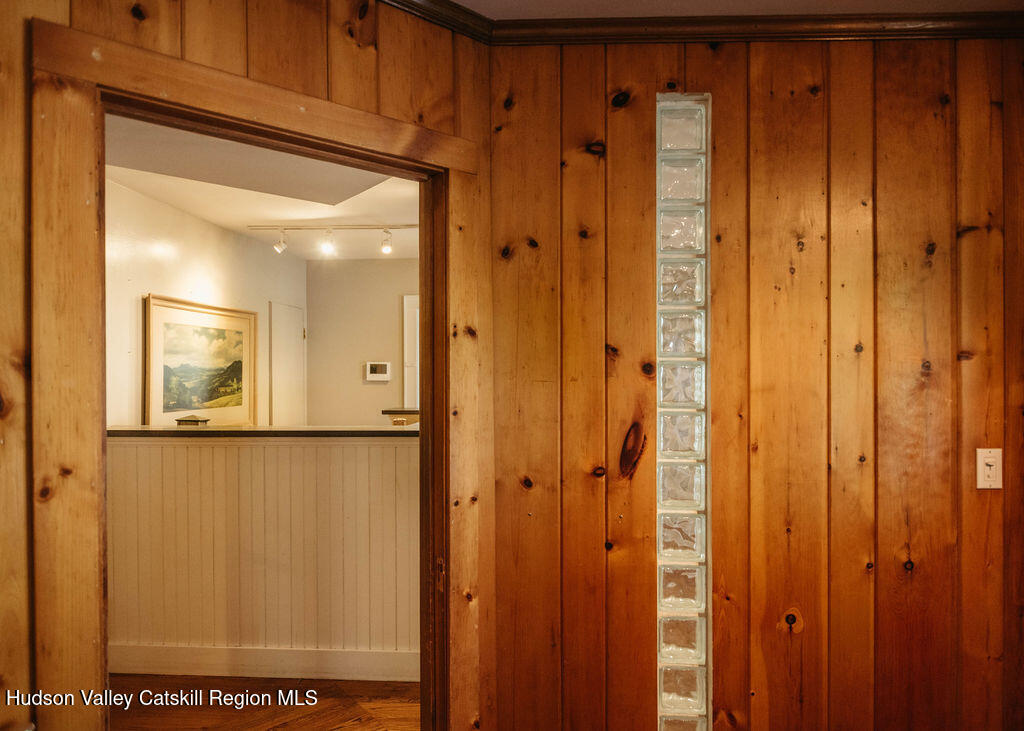 3927 Main Street Stone Ridge, NY 12484 - Photo 24 of 32 a view of a bathroom with a shower and a sink