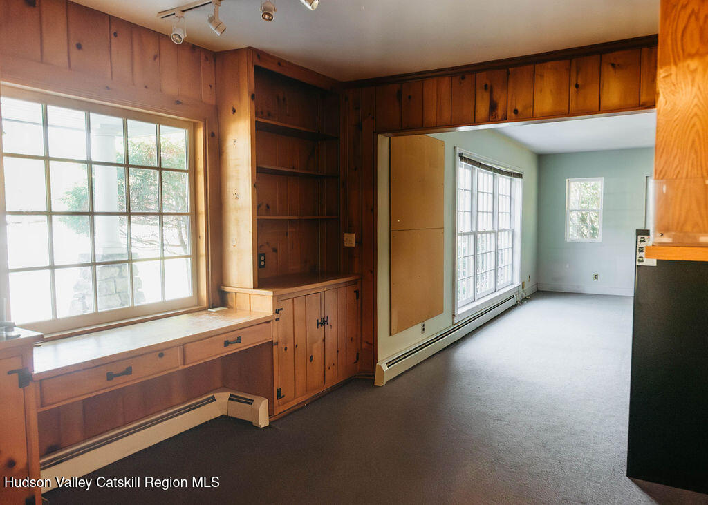 3927 Main Street Stone Ridge, NY 12484 - Photo 26 of 32 a room with window and cabinet