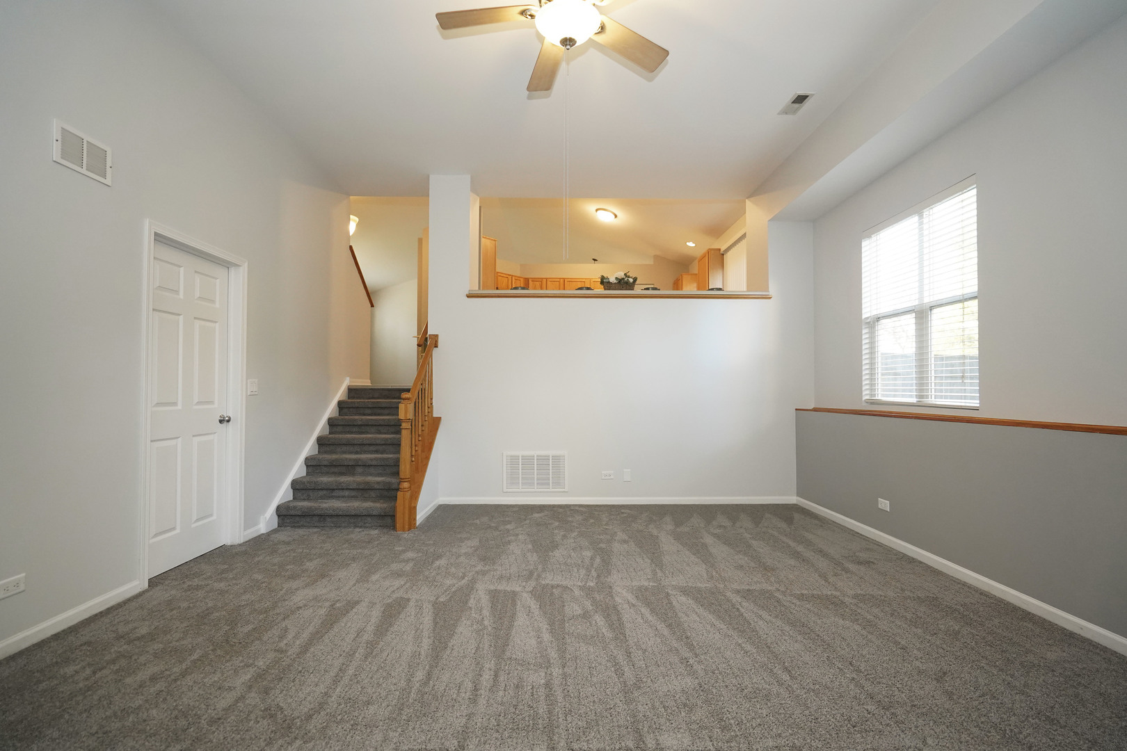 24300 White Oak Drive Plainfield, IL 60585 - Photo 17 of 32 wooden floor in an empty room with a window
