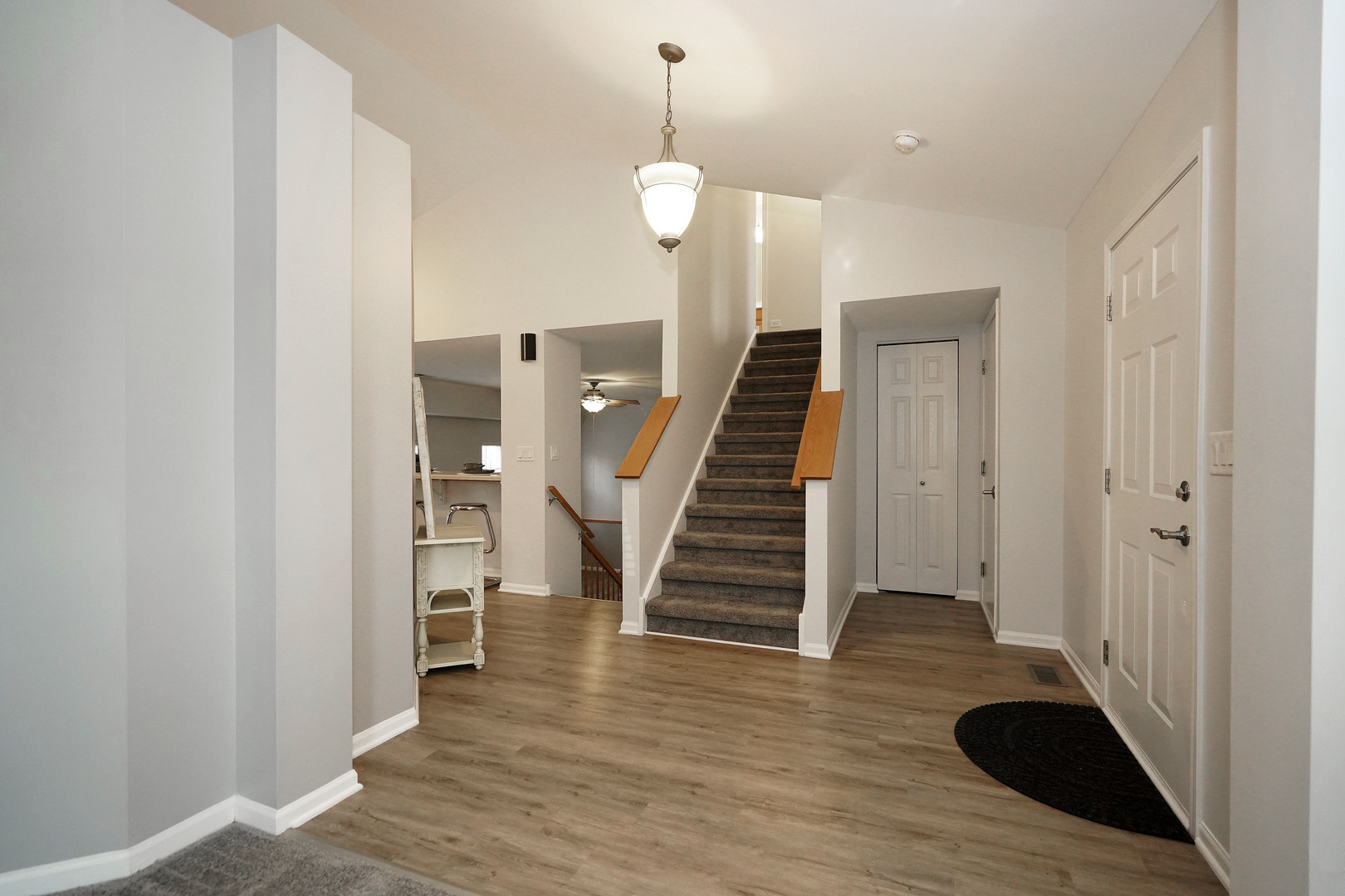 24300 White Oak Drive Plainfield, IL 60585 - Photo 20 of 32 a view of entryway and hall with wooden floor