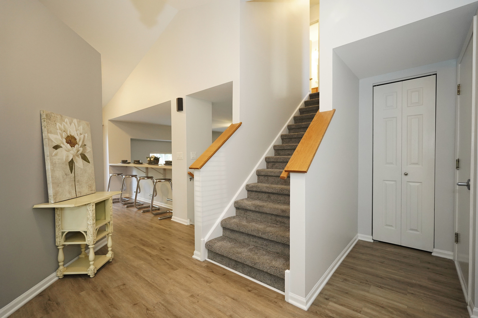 24300 White Oak Drive Plainfield, IL 60585 - Photo 3 of 32 a view of a hallway with wooden floor and entryway