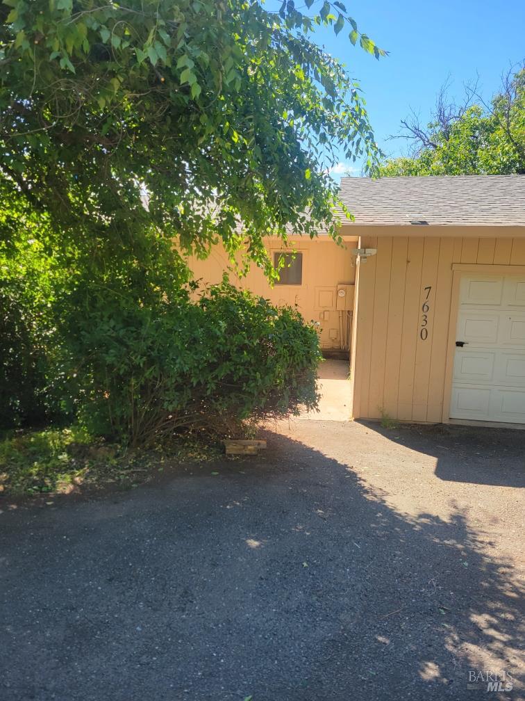 7630 Walnut Lane Lower Lake, CA 95457 - Photo 2 of 11 a view of a house with a tree