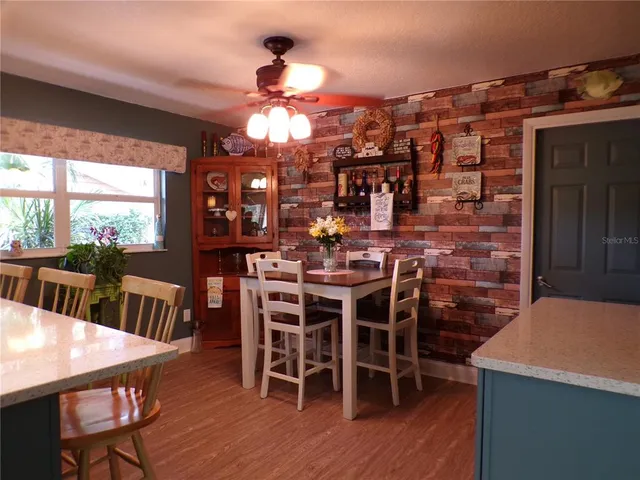 a view of a workspace with furniture