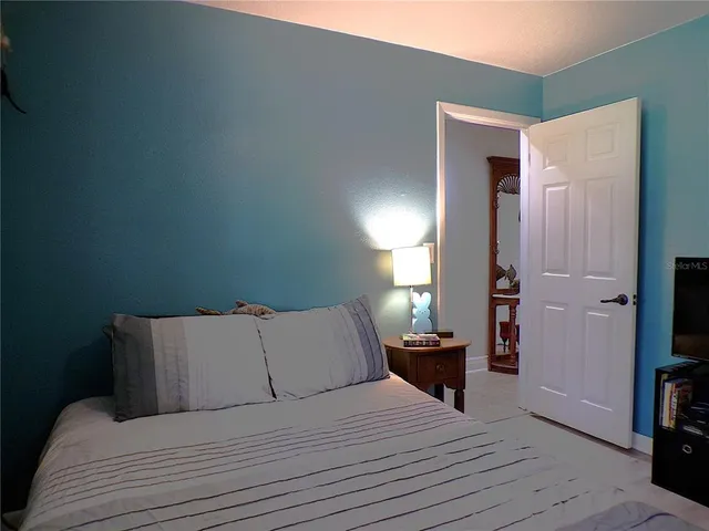 a view of a swimming pool with an outdoor space and seating area