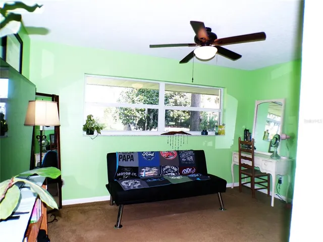 an aerial view of house with yard