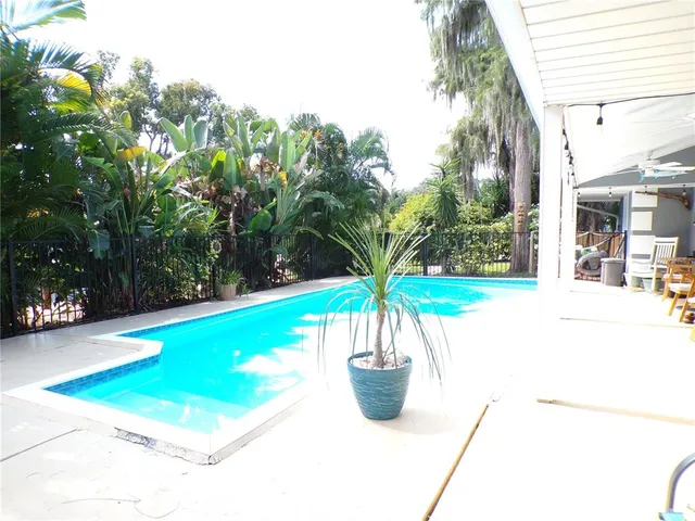 an aerial view of a house with a garden