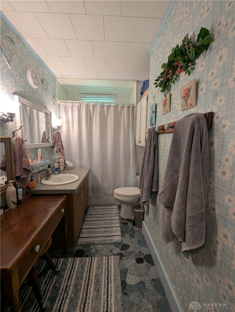 8713 Oakes Road Arcanum, OH 45304 - Photo 24 of 29 This bright bathroom provides a clean and functional space for daily routines.