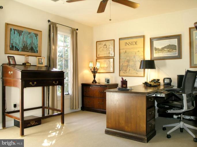 1300 Stamford Way Reston, VA 20194 - Photo 19 of 30 a view of a workspace with furniture and a window