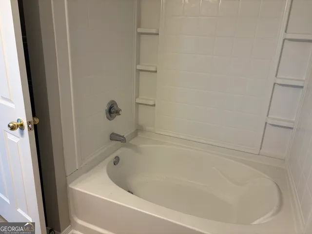 a bathroom with a bathtub