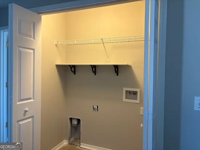 a view of a door and a window