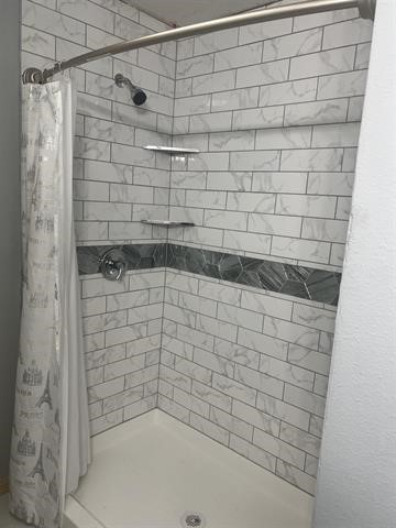 775 West Herring Street Sour Lake, TX 77659 - Photo 11 of 21 a bathroom with a shower