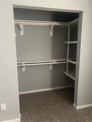 a bathroom with a sink vanity and mirror