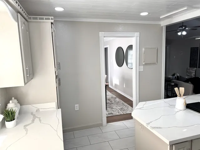 a bathroom with a sink and mirror