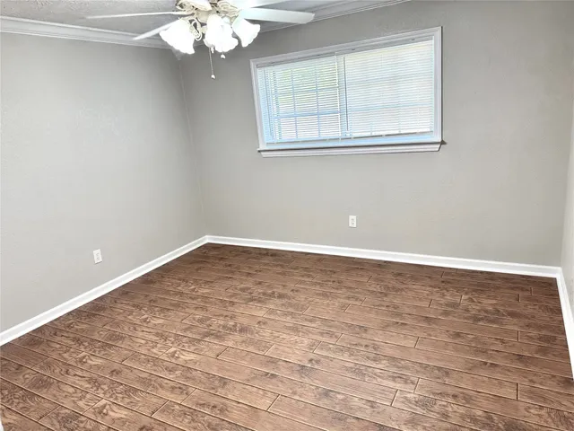 a view of a room with a large window