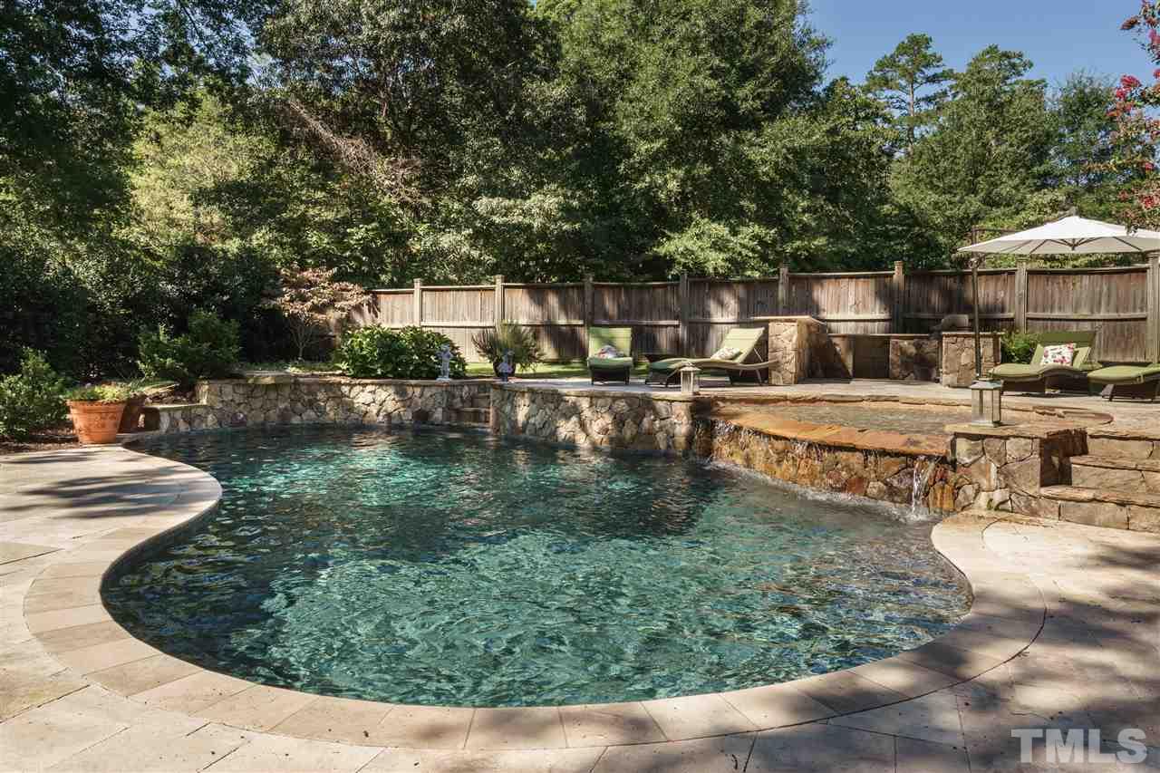 3029 Farrior Road Raleigh, NC 27607 - Photo 1 of 25 ...best describes this awesome custom pool and patio. Travertine marble decking and patio, a kiddie section with a place to install an umbrella to block the sun from tender skin, a fire pit and patio on the far side of the pool---wow!